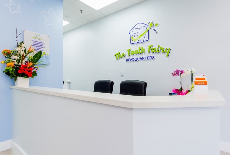 Reception desk of The Tooth Fairy HQ pediatric dental office in North Lauderdale, Florida
